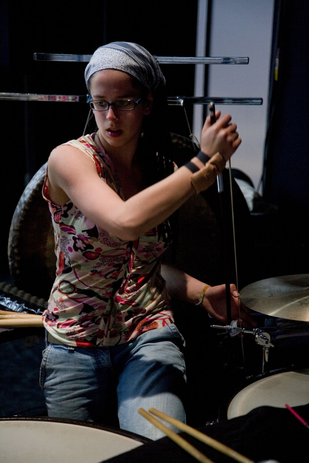 Claudia Hansen playing timpani in a percussion setup during the opera Medea directed by Lotte de Beer